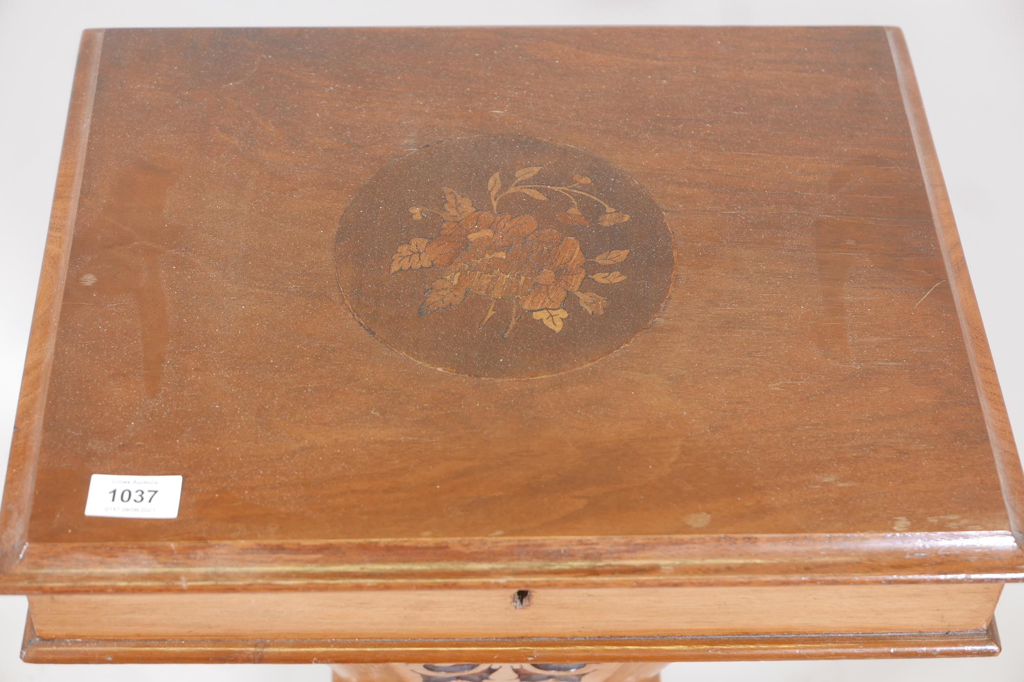 A Victorian walnut workbox with lift up top and pierced basket, raised on a turned column and carved - Image 2 of 5