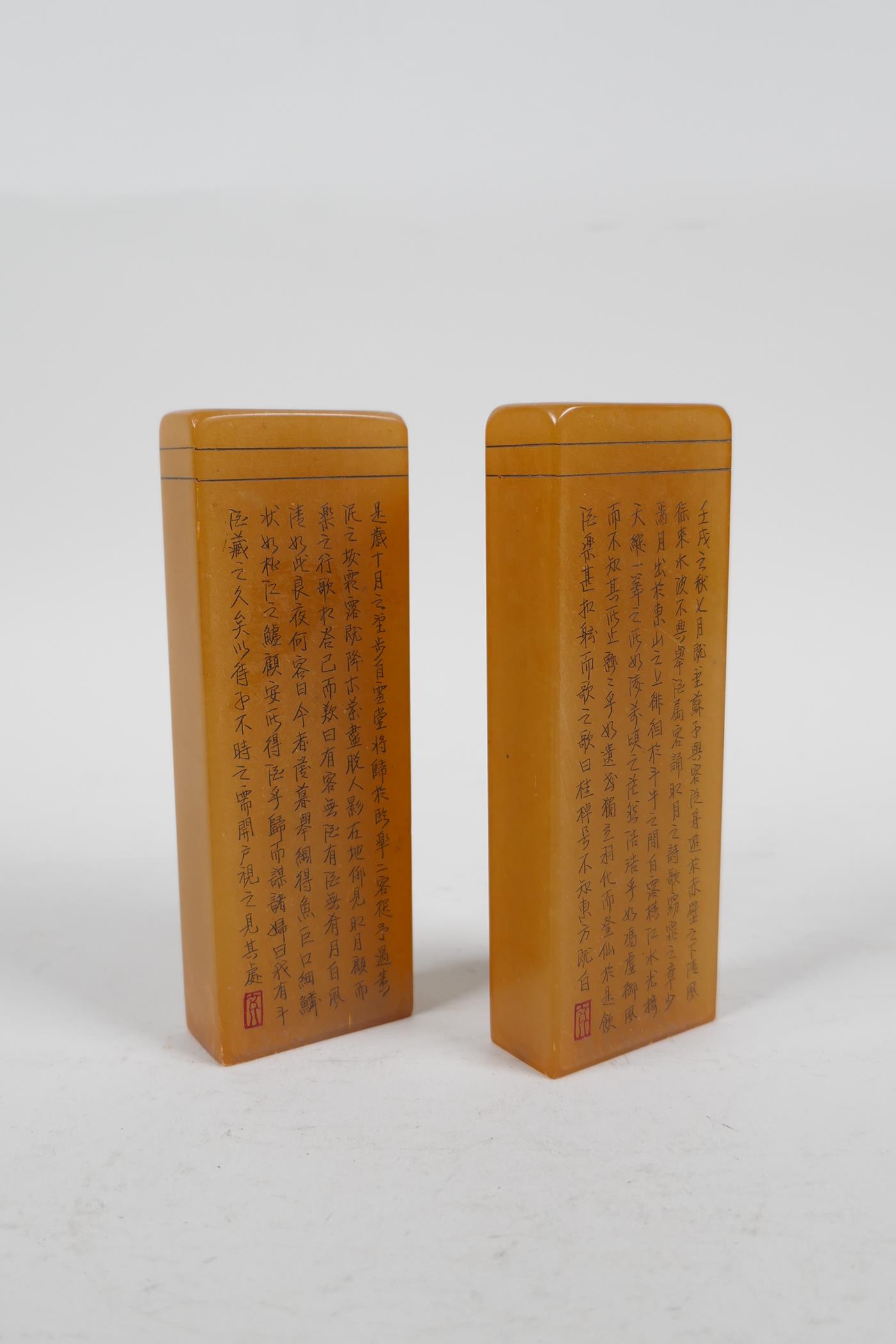 A pair of Chinese soapstone seals with engraved character inscriptions, 4" high