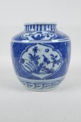 A Chinese blue and white porcelain pot, with decorative panels depicting birds and flowers, 6½" high