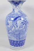 A Chinese blue and white porcelain vase decorated with birds and flowers, 12½" high