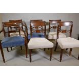 A set of four and two Georgian mahogany bar back dining chairs, on turned supports