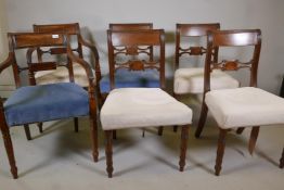 A set of four and two Georgian mahogany bar back dining chairs, on turned supports