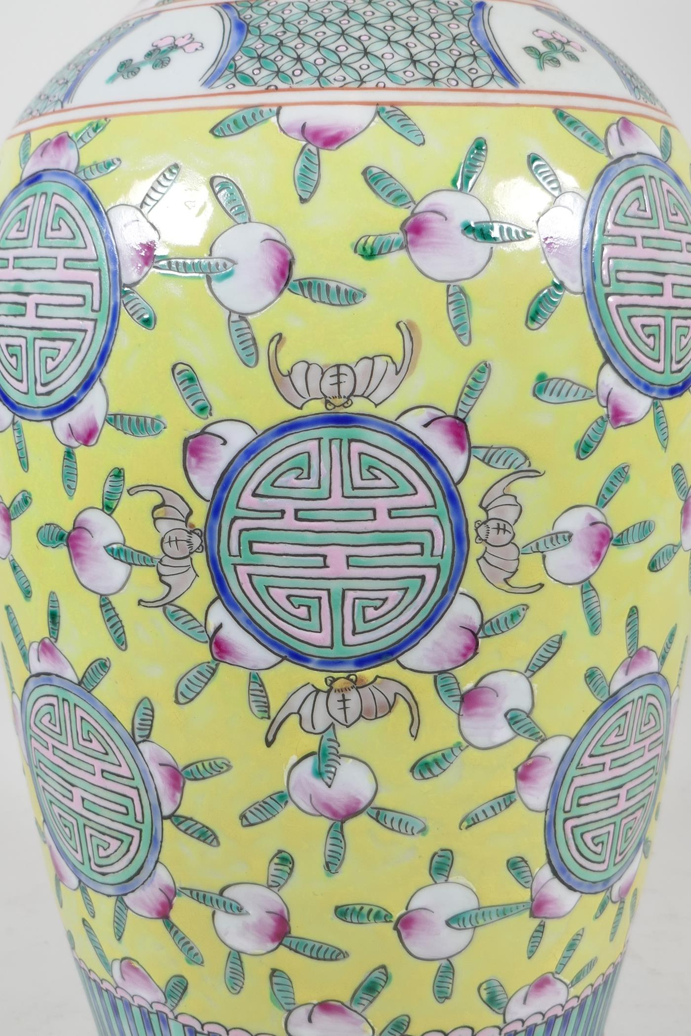 A Chinese yellow ground porcelain vase decorated with auspicious symbols, bats and peaches, 6 - Image 2 of 5