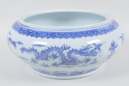 A Chinese blue and white porcelain bowl painted with herons amongst the reeds, 10" diameter (