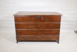 An C18th Continental elm mule chest, with plank top and front, and brass stud decoration, 45" x