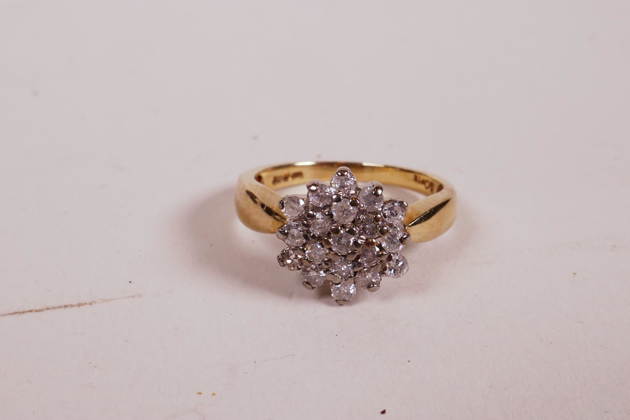 A 9ct yellow gold ring set with a cluster of diamonds, 0.5ct, 2.8g, size 'K' - Image 2 of 2