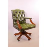 A button leather swivel desk chair, 38" high