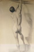 A C19th charcoal life study of a nude male reaching for a rope, signed and dated 1888, 22" x 30"