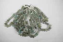 A quantity of string glass beads