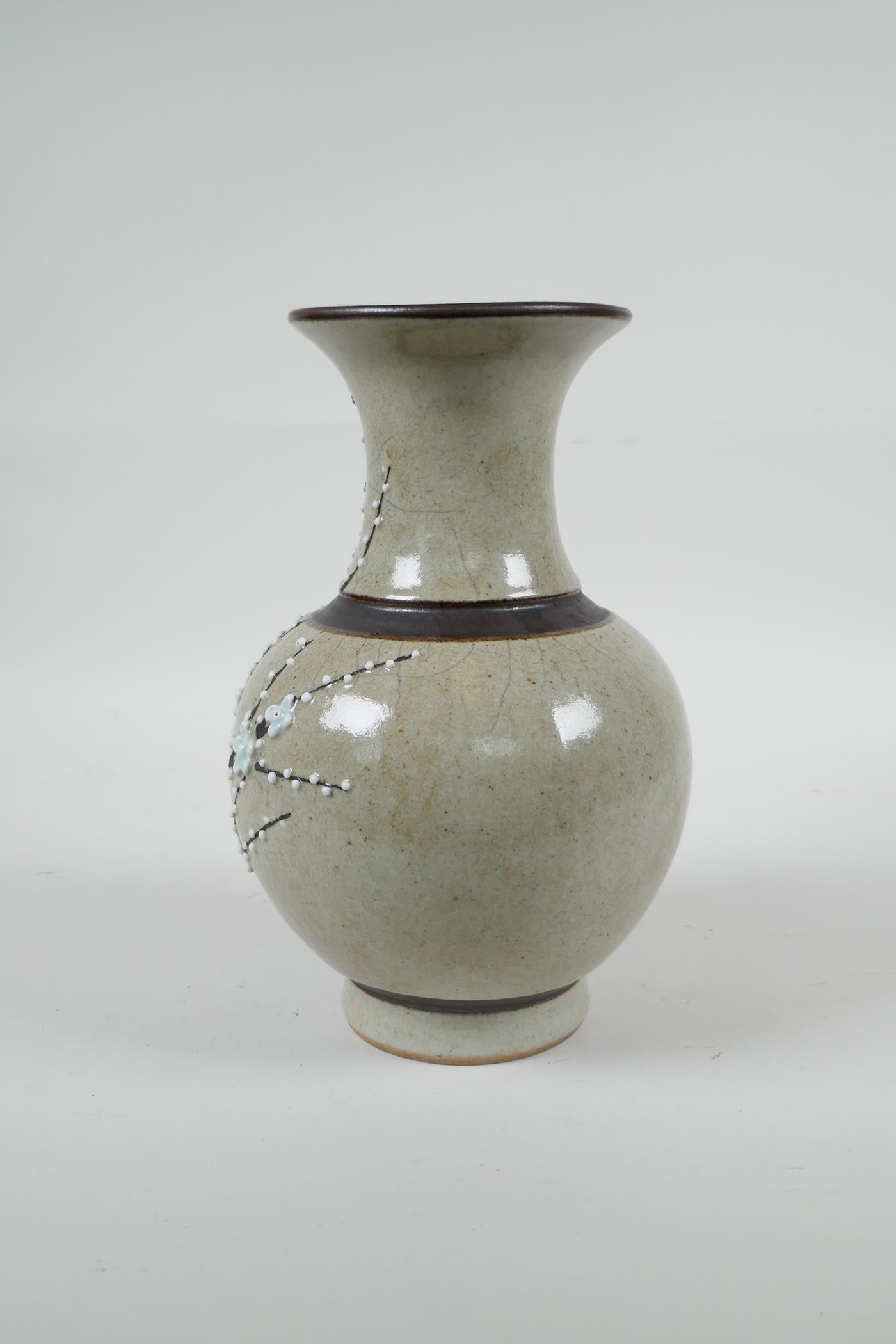 A Chinese beige ground pottery vase with bronze style bands and prunus blossom decoration, 8" high - Image 2 of 4