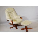 An 'Ekornes Stressless' type leather reclining and swivelling armchair and matching stool