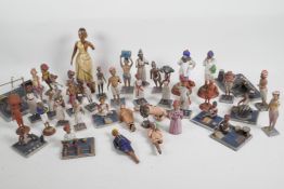 A collection of 41 vintage Indian painted wood and terracotta figures