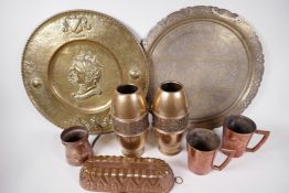 An Indian brass tray with shaped and pierced rim engraved with figures and animals, 17¾" diameter,