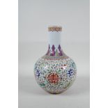 A Chinese famille rose enamelled porcelain vase with scrolling lotus flower decoration, seal mark to