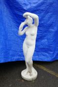 A painted concrete garden statue of Venus, 46½" high