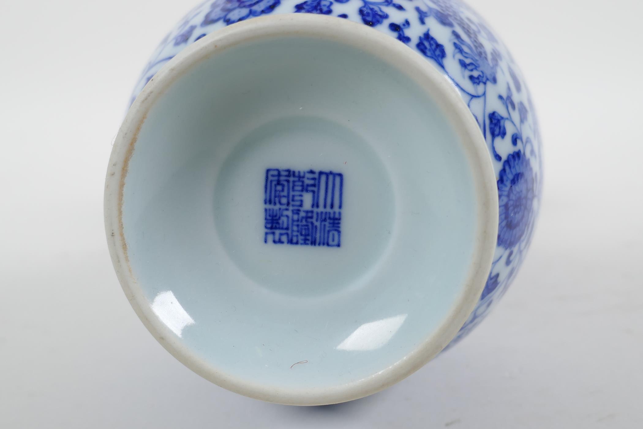 A Chinese blue and white porcelain vase with dragon and lotus flower decoration, seal mark to - Image 5 of 5