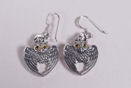 A pair of 925 silver earrings in the form of owls