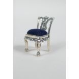 A sterling silver pincushion in the form of a Chippendale chair, 1½"