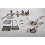 A quantity of sterling silver, all hallmarked, including cruets, two serving spoons, a pusher,