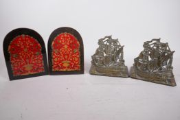 A pair of cast brass bookends in the form of three masted warships, 6" high, together with a pair of
