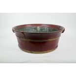 A brass banded fruitwood jardiniere with a metal liner, losses, 17" diameter, 6" high