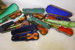 Eight violins for restoration, various states of disrepair, and including several good carry