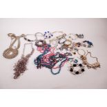 A quantity of costume jewellery, bead necklaces, bangles etc