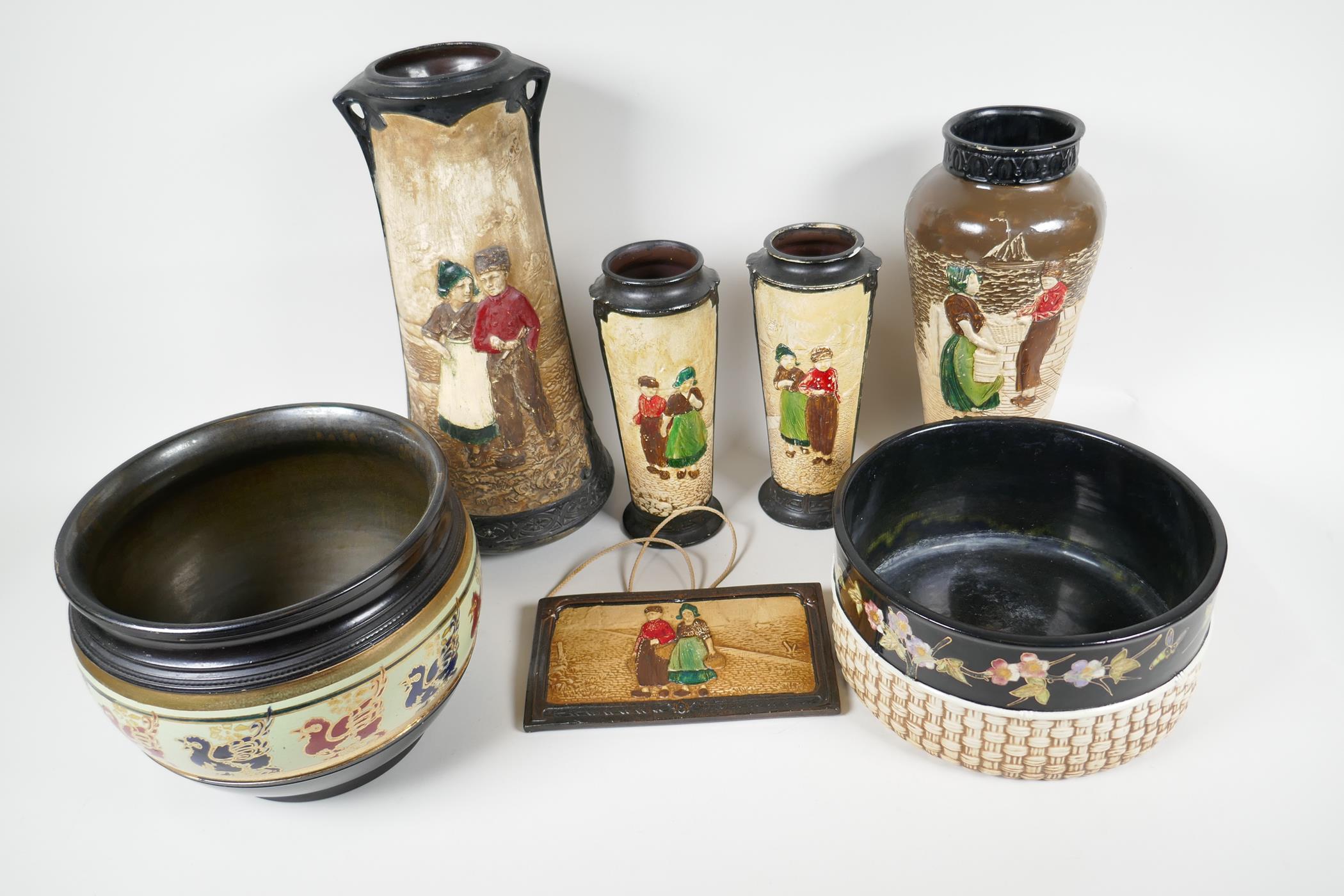 Two Bretby pottery planters with 'cloisonne' birds and flower decoration, together with four