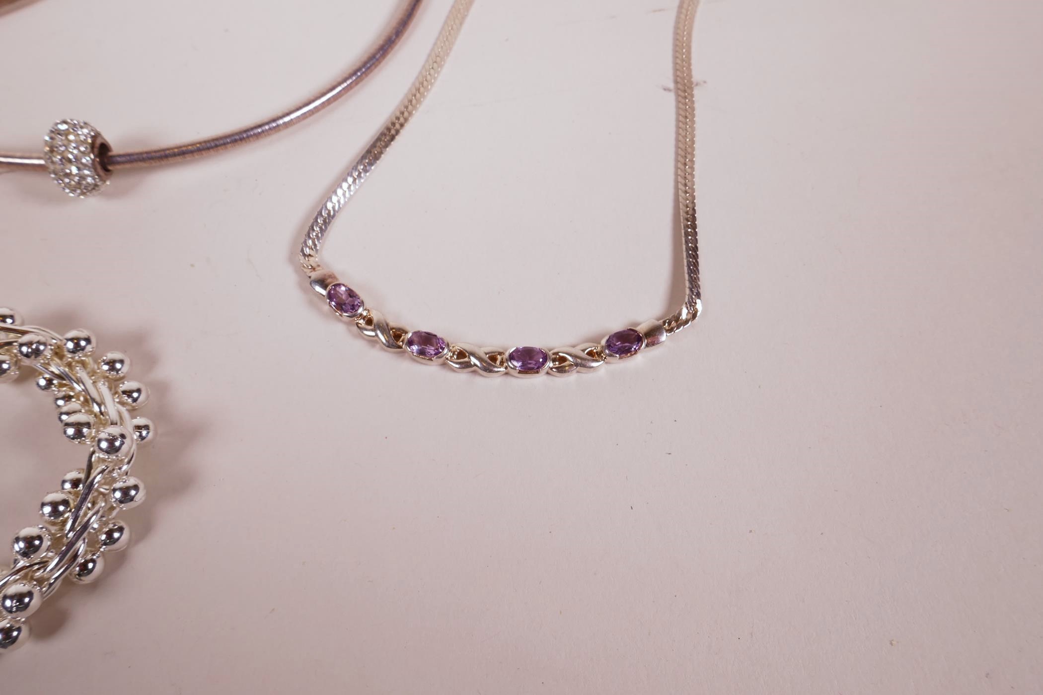 A silver and amethyst set necklace, a silver and crystal pendant choker and three other silver - Image 3 of 5