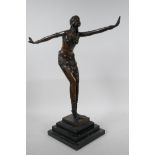 An Art Deco style bronze figure of a dancing girl in the manner of Preiss on a stepped plinth, 15"