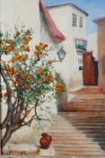 Alix Jennings (British, 1884-1980), 'Mediterranean Street Scene with Orange Tree', signed lower