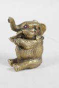 An elephant shaped brass vesta case, impressed mark to base, 2" high