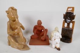 Five figures including red earthenware man, composition Buddha, Hamnet pig figure, Balinese wood