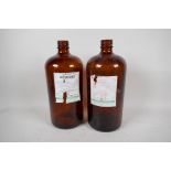 Two brown glass chemist bottles, 12" high
