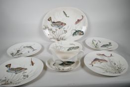 A Johnson's Brothers pottery fish service comprising oval serving platter, 16" x 12", five 10"