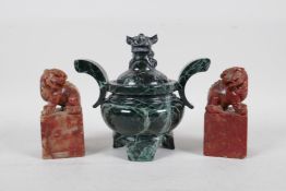 A pair of Chinese red soapstone seal blanks with carved kylin knops, together with a vert de mer