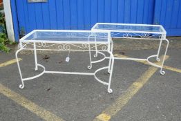 A pair of painted metal coffee tables, with glass tops, 36" x 20", 19½" high