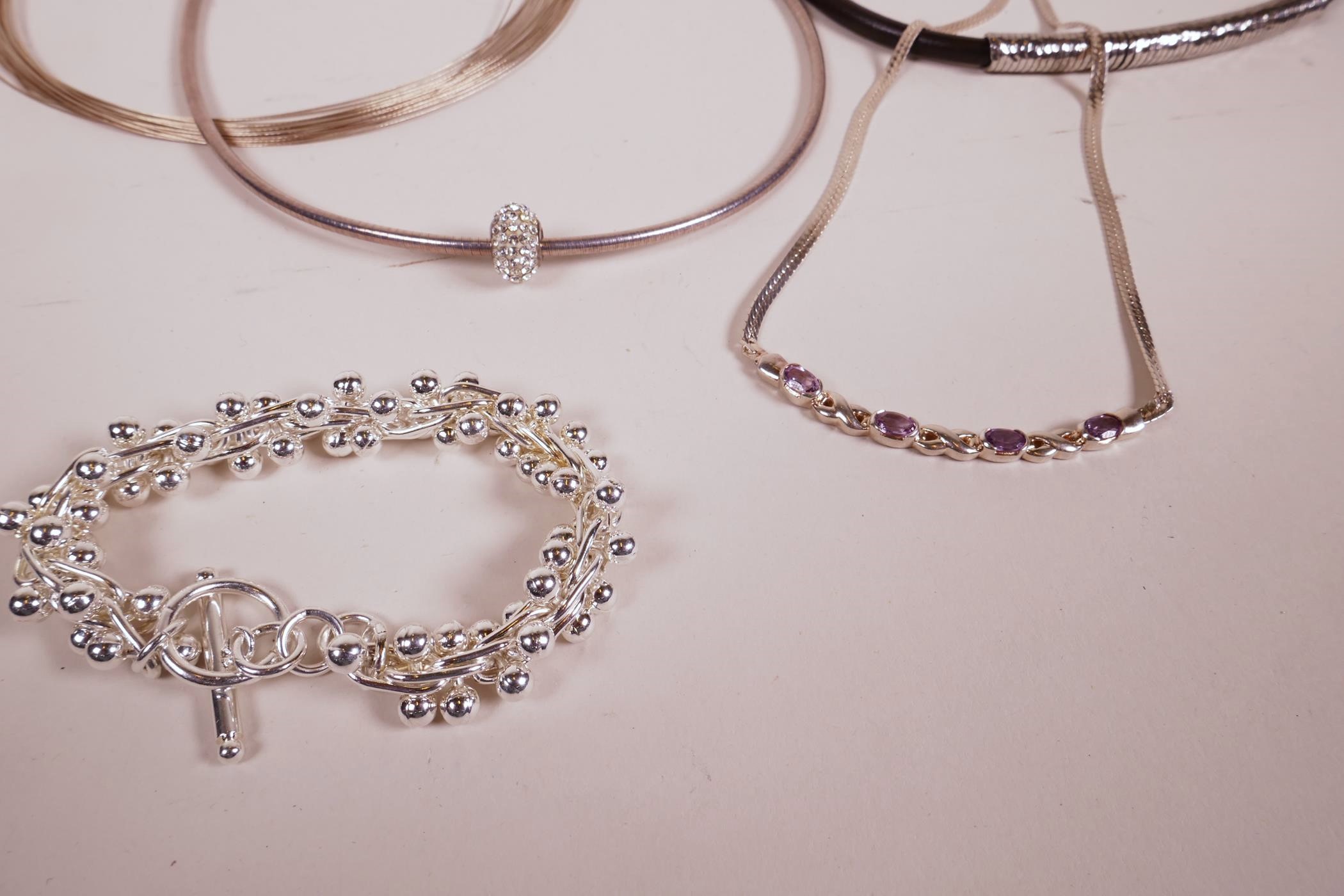 A silver and amethyst set necklace, a silver and crystal pendant choker and three other silver - Image 2 of 5