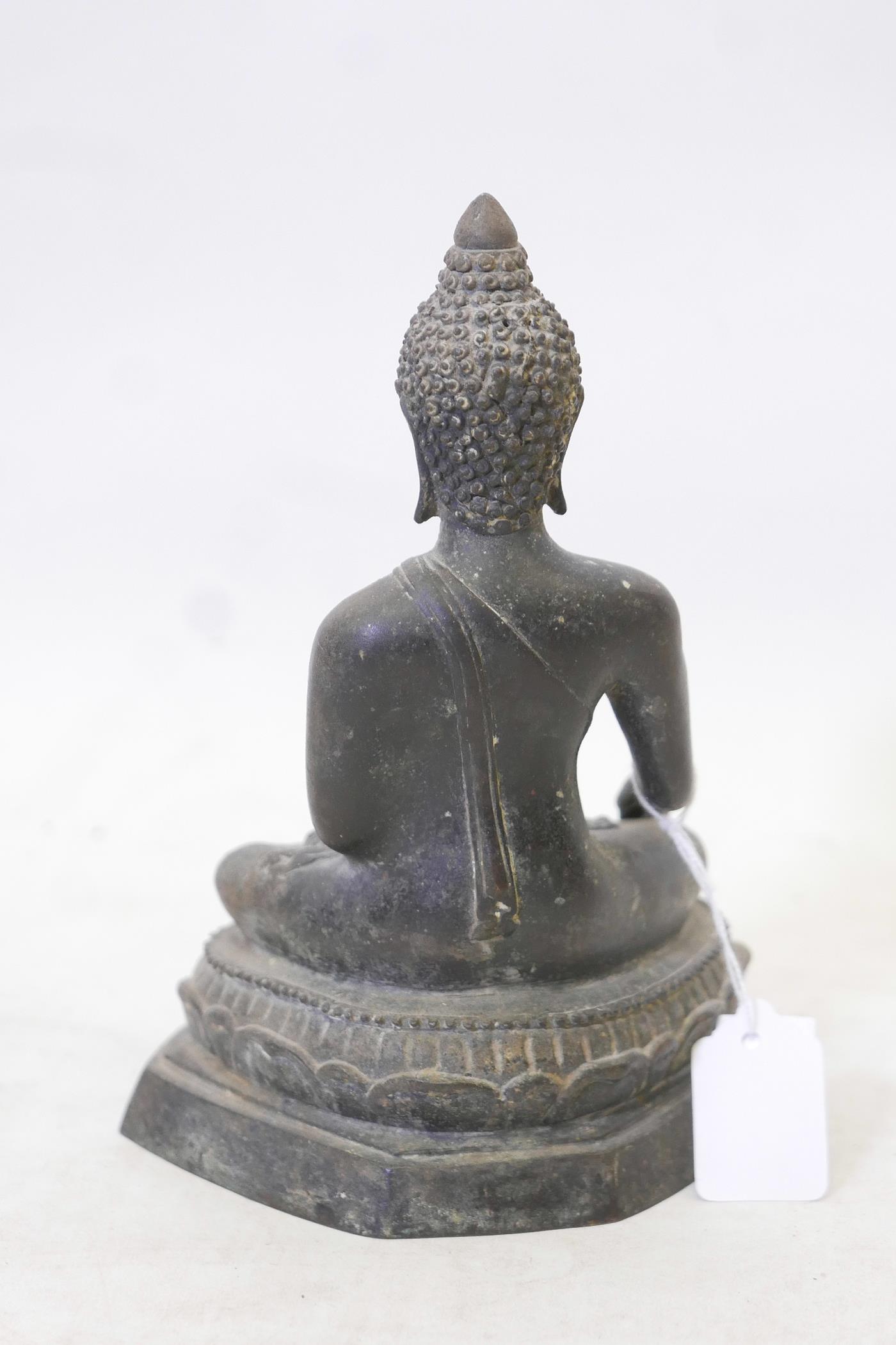 A C19th Siamese bronze Buddha, seated upon a lotus throne and inscribed to the base, 8" high - Image 3 of 5