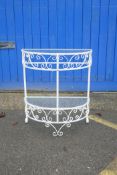 A painted metal demi-lune two tier garden table, 26" x 13", 30" high