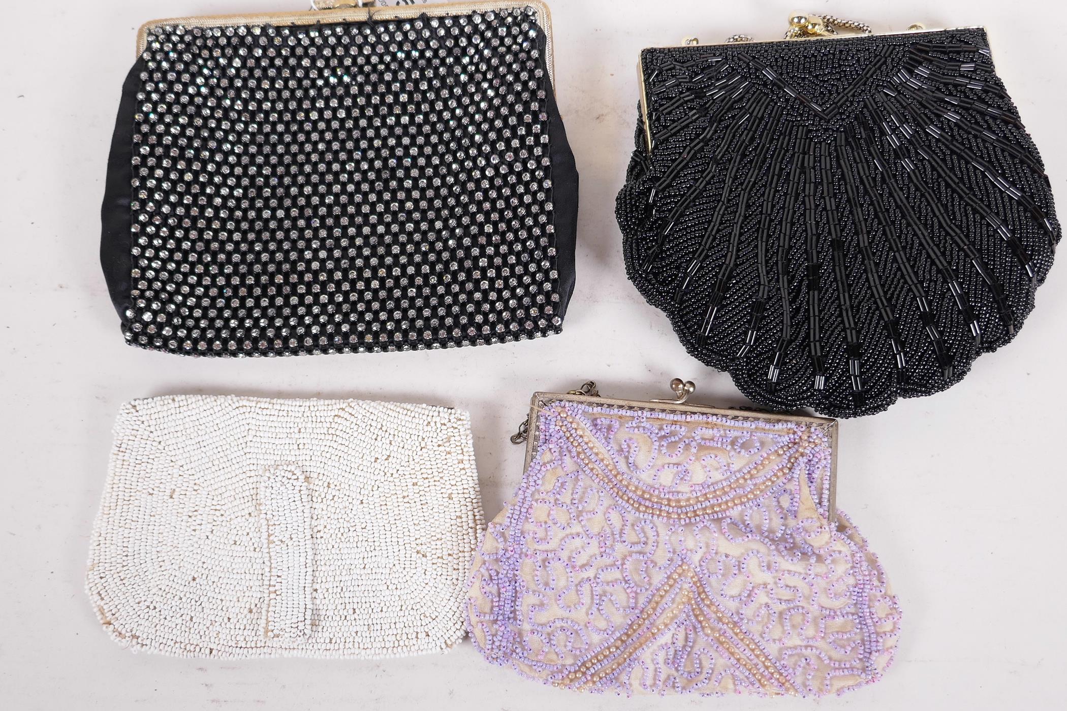 A vintage diamante purse, 6" x 5", and three beadwork purses