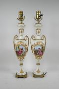 A pair of Continental Sevres style pottery lamps with ormolu mounts and handles, and decorative