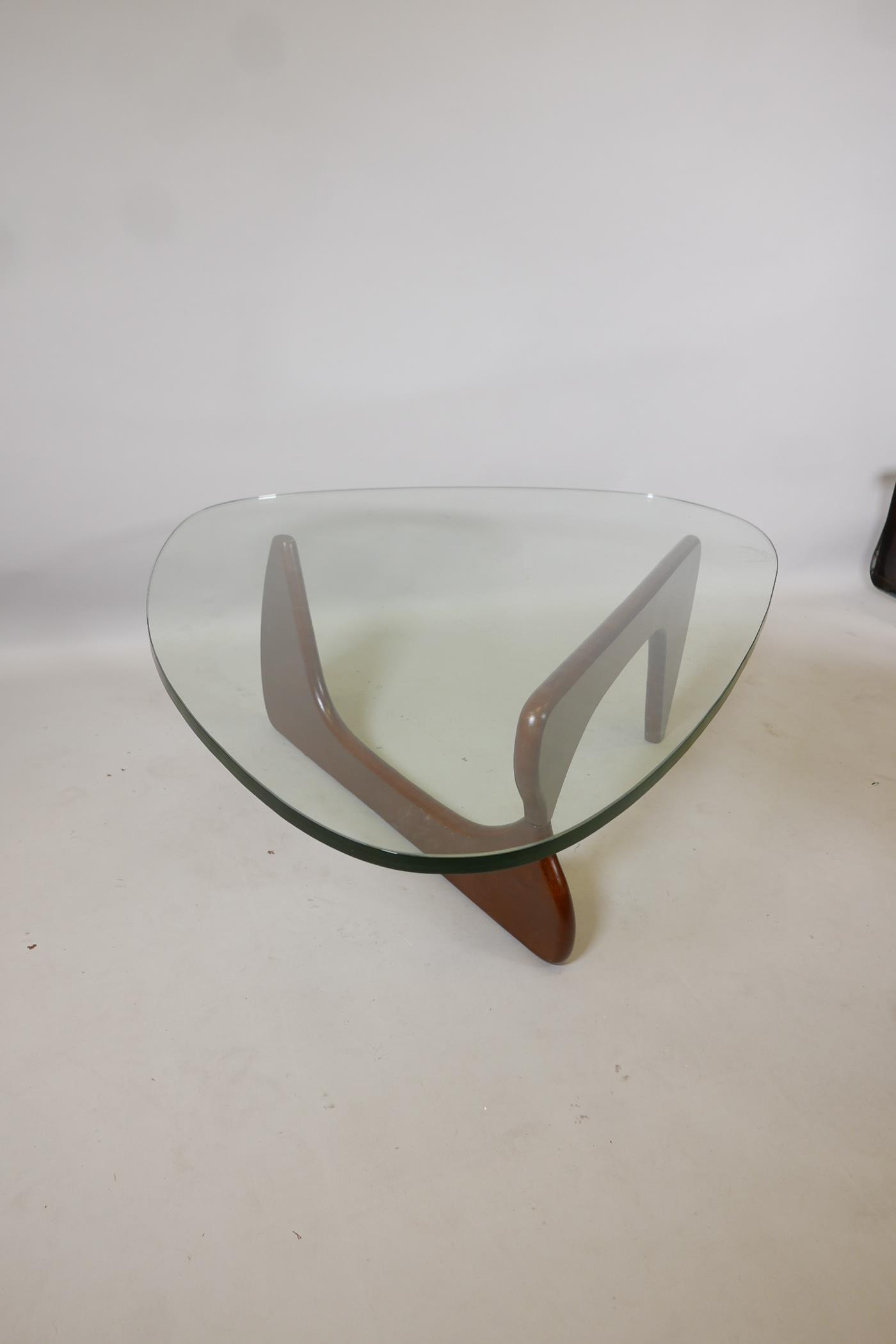 An Isamu Noguchi style pebble shaped coffee table with glass top, 50" x 37½", 16" high - Image 3 of 3