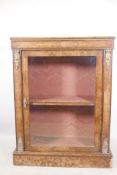 A Victorian figured walnut pier cabinet, with boxwood inlaid decoration and gilt brass mounts,