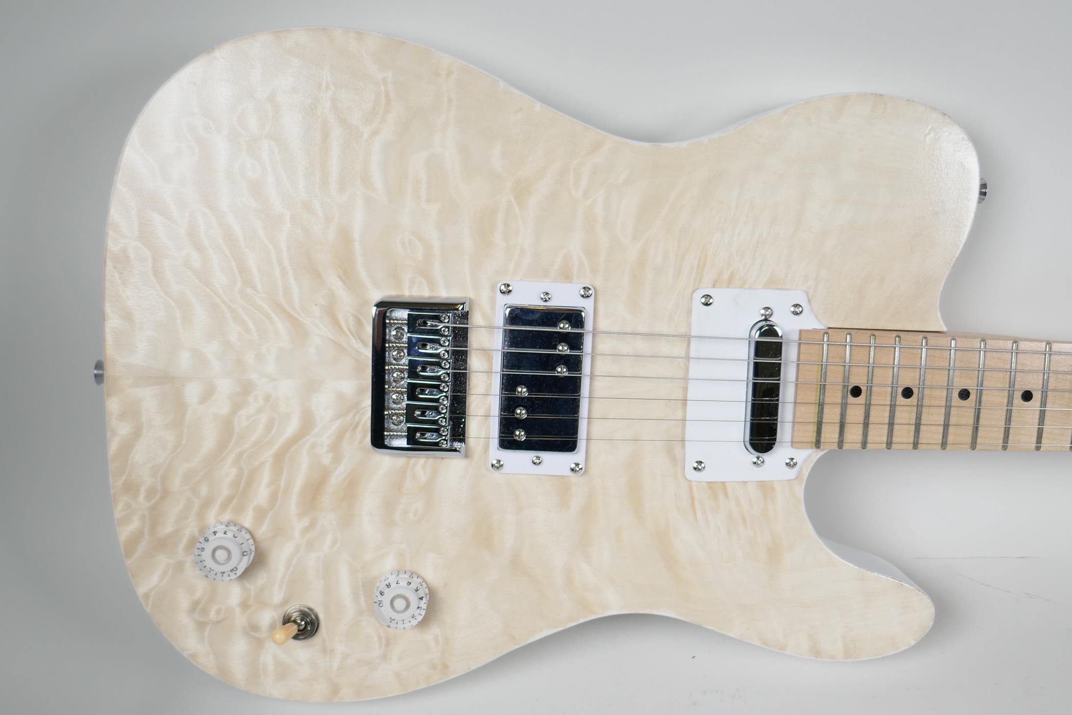 An electric guitar in the style of a Fender with blonde maple veneered body, the head bears label - Image 2 of 4