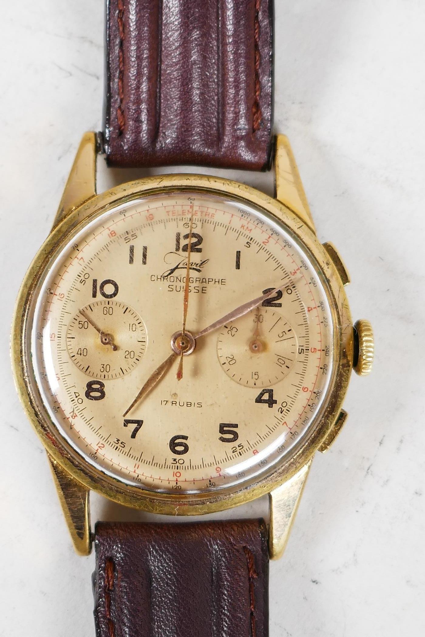 A vintage Swiss made gentleman's wristwatch by Janil, the face with secondary day and seconds dial