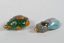 A Chinese polychrome porcelain snuff bottle in the form of a cicada, and another in the form of a