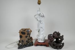 A Chinese table lamp, the base mounted with a figure of Quan Yin, 16" high, together with two carved