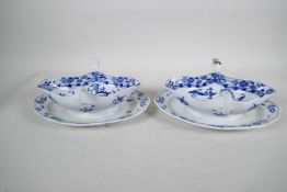 A pair of late C18th/early C19th Meissen 'Onion' Pattern blue and white two handled gravy boats, 10"
