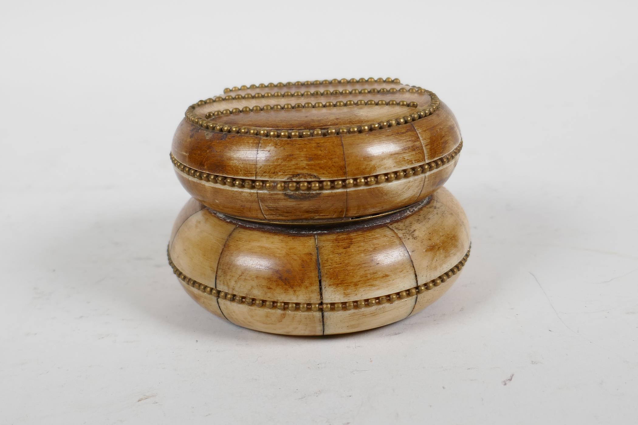 A sectional bone box and cover with brass beaded details, 3" diameter - Image 3 of 4